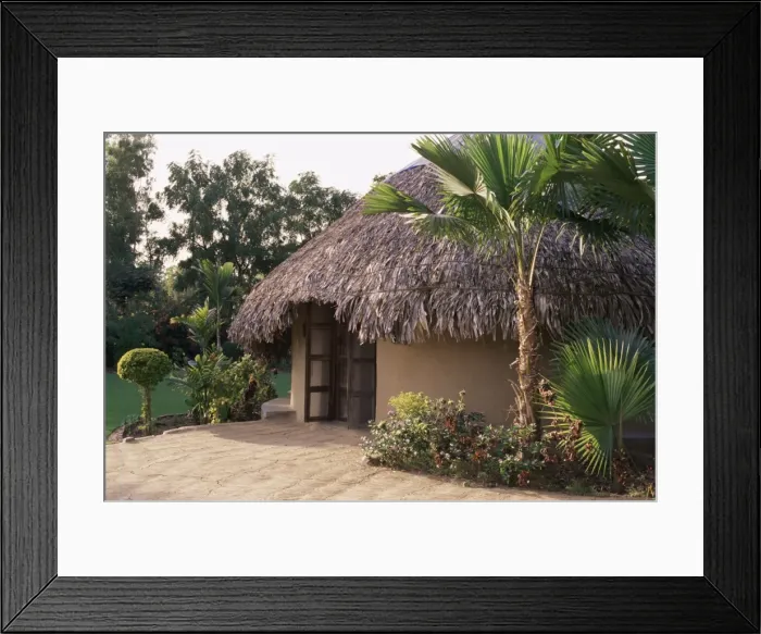 Framed Print : Modern residential home in traditional tribal Rabari round mud hut Framed Print : Modern residential home in traditional tribal Rabari round mud hut