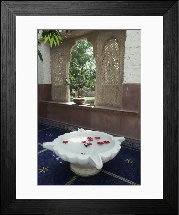 Framed Print : Old architectural stone salvage has been incorporated Framed Print : Old architectural stone salvage has been incorporated