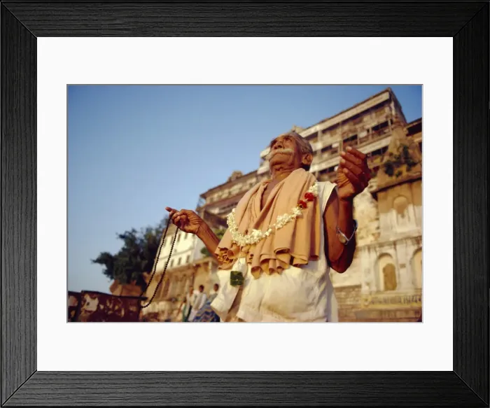 Framed Print : Ghatia meditating in earling morning on the ghats by Framed Print : Ghatia meditating in earling morning on the ghats by