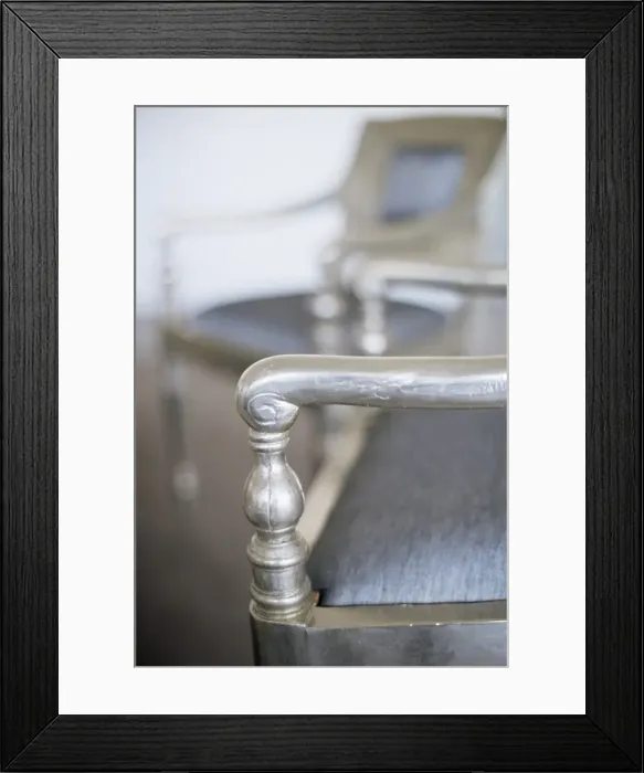 Framed Print : Detail of a silver leafed chair in the conference room Framed Print : Detail of a silver leafed chair in the conference room