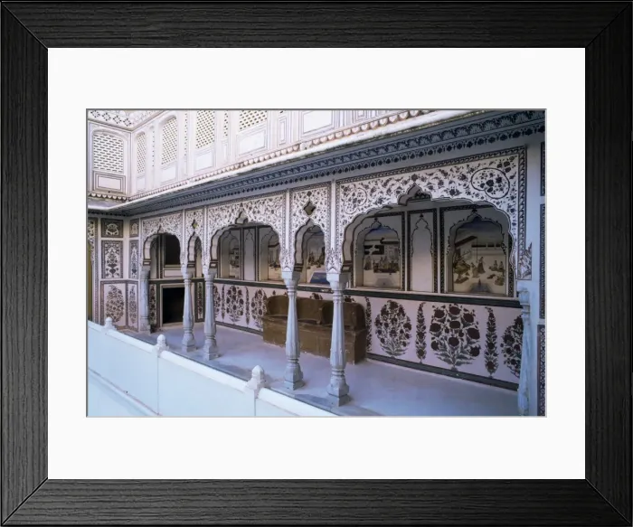 Framed Print : The painted walls of a covered verandah which surrounds Framed Print : The painted walls of a covered verandah which surrounds