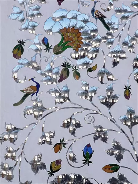 Detail of the coloured glass and mirror inlay work