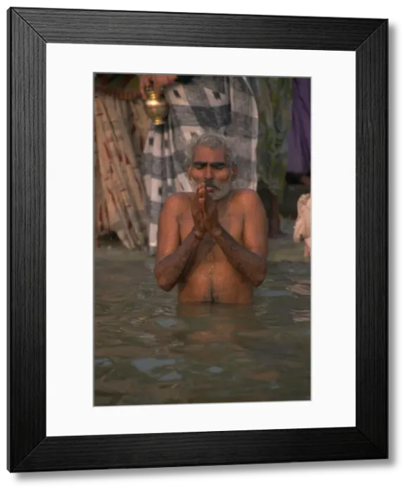 Framed Print : Hindu religious rites in the holy River Ganges (Ganga) Framed Print : Hindu religious rites in the holy River Ganges (Ganga)