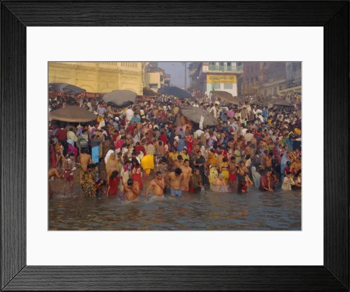 Framed Print : Hindu religious morning rituals in the Ganges (Ganga) River Framed Print : Hindu religious morning rituals in the Ganges (Ganga) River