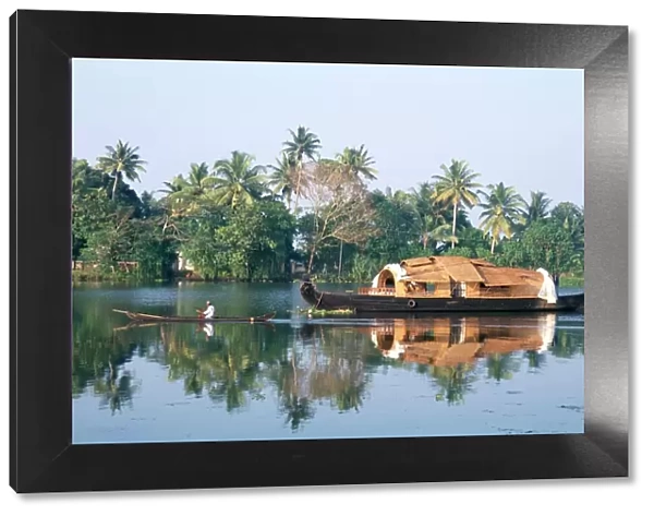 Tourists rice boat on the backwaters near Kayamkulam