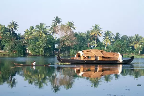 Tourists rice boat on the backwaters near Kayamkulam