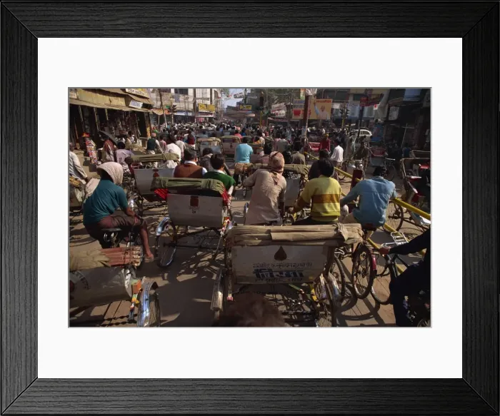 Framed Print : Crowded street scene with rickshaws and bicycles Framed Print : Crowded street scene with rickshaws and bicycles