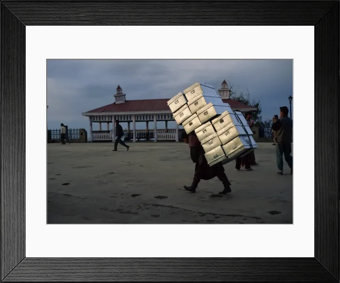 Framed Print : Porter under a heavy load Framed Print : Porter under a heavy load