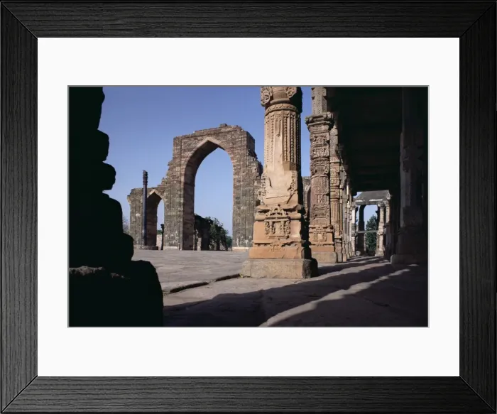 Framed Print : Iron pillar in the Quwwat ul Islam mosque Framed Print : Iron pillar in the Quwwat ul Islam mosque