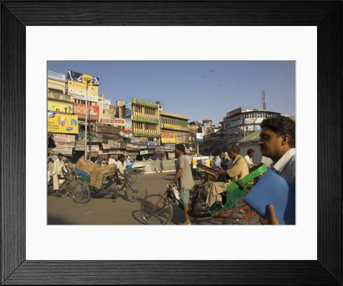 Framed Print : People and rickshaws crossing the square Framed Print : People and rickshaws crossing the square