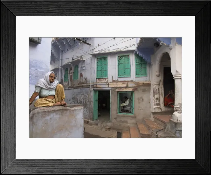 Framed Print : Elderly woman near a tailors workshop Framed Print : Elderly woman near a tailors workshop