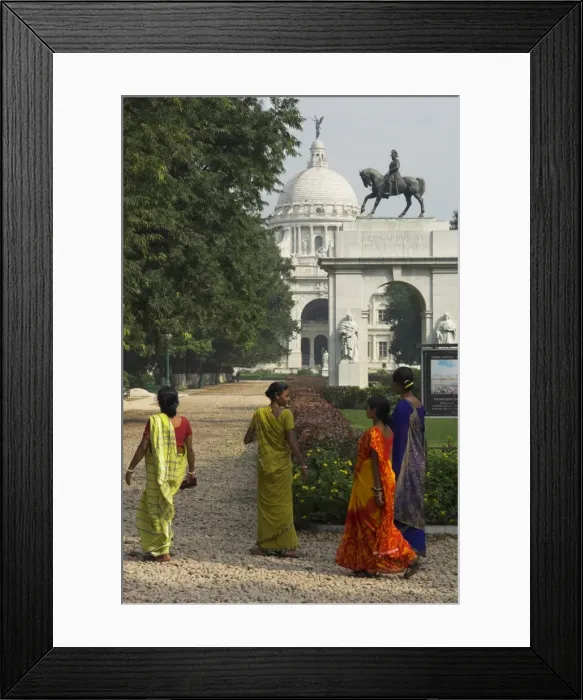 Framed Print : Women wearing colourful saris in the park with Framed Print : Women wearing colourful saris in the park with