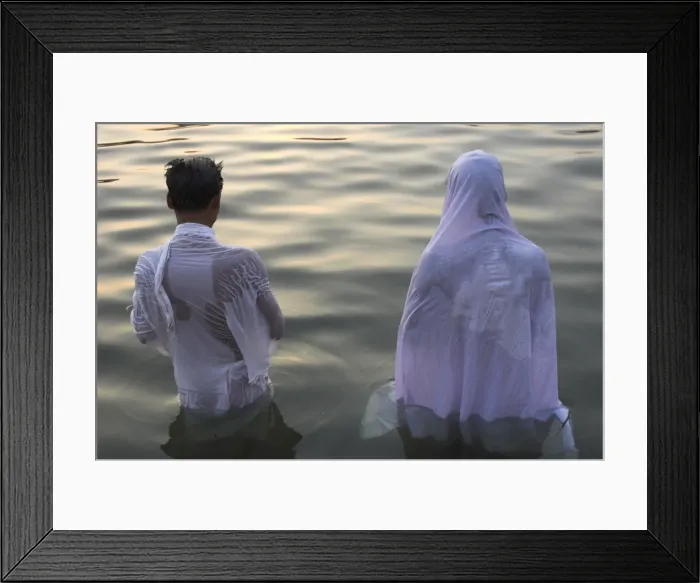 Framed Print : Two pilgrims in white dress making Puja celebration Framed Print : Two pilgrims in white dress making Puja celebration
