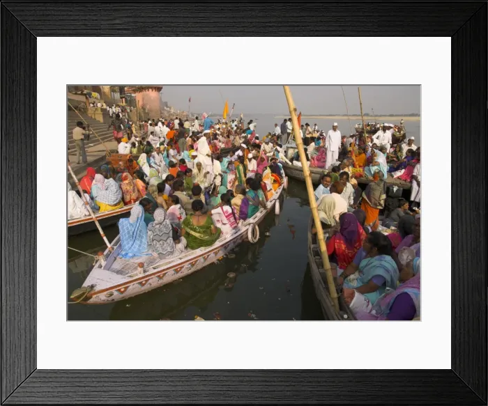 Framed Print : Groups of pilgrims in small boats on their way to a Framed Print : Groups of pilgrims in small boats on their way to a