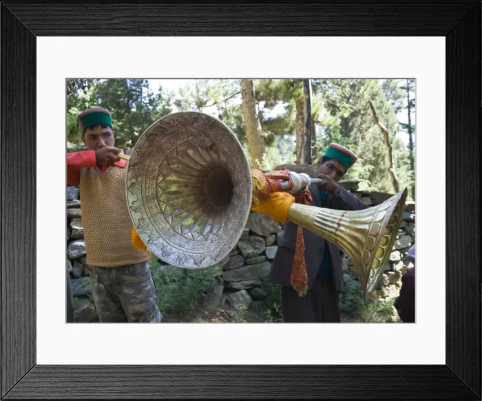 Framed Print : Two local men blowing large traditional wind instruments Framed Print : Two local men blowing large traditional wind instruments