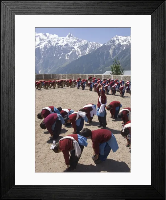 Framed Print : Group of school children in uniform during morning Framed Print : Group of school children in uniform during morning