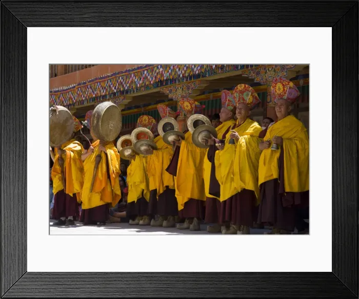 Framed Print : Monks standing in yellow costumes accompanying those Framed Print : Monks standing in yellow costumes accompanying those