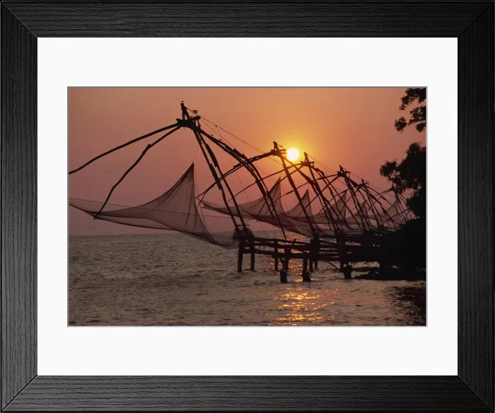 Framed Print : A line of Chinese fishing nets on the coast at sunset Framed Print : A line of Chinese fishing nets on the coast at sunset