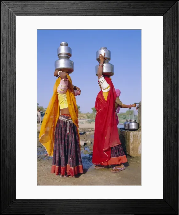 Framed Print : Two women by a well carrying water pots Framed Print : Two women by a well carrying water pots