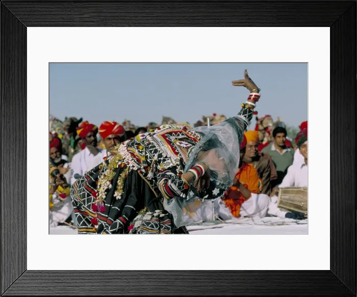 Framed Print : Woman dancing during desert festival Framed Print : Woman dancing during desert festival