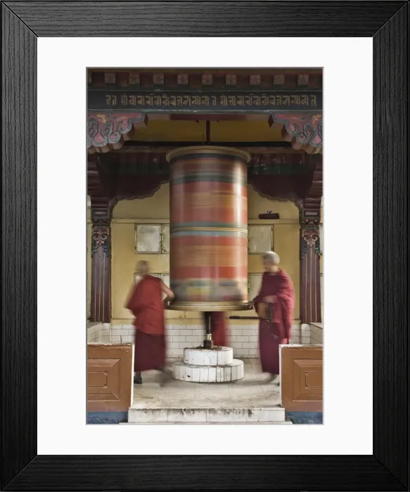 Framed Print : Buddhists turning prayer wheel Framed Print : Buddhists turning prayer wheel