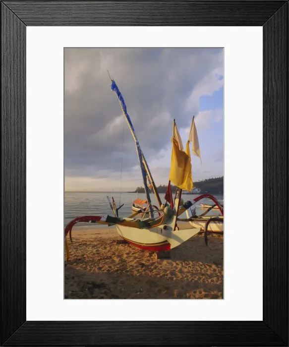 Framed Print : Traditional outrigger boats drawn up on the beach in Framed Print : Traditional outrigger boats drawn up on the beach in