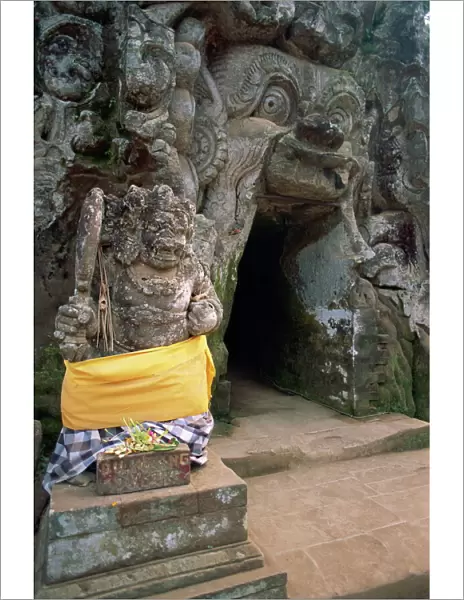 Guardian statue and entrance to the Goa Gajah