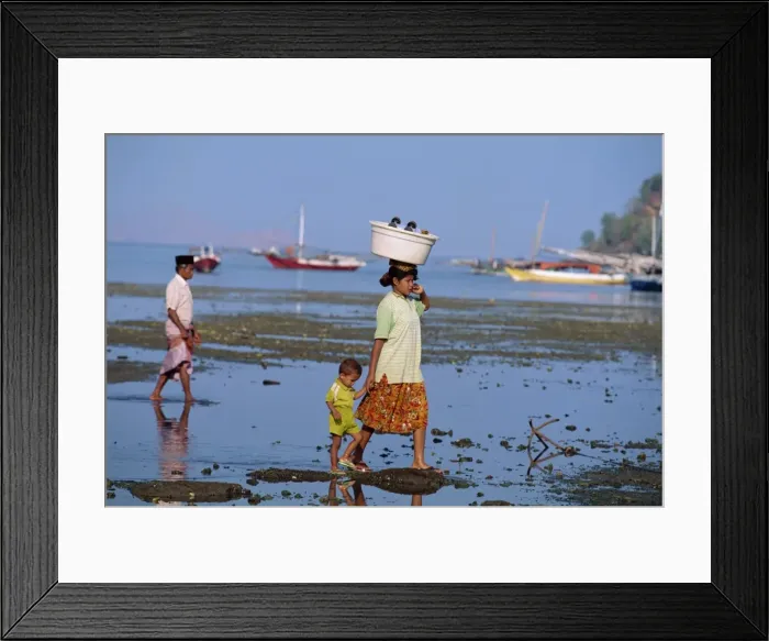 Framed Print : Mother and child walking at low tide off the port of Labuhanbajo Framed Print : Mother and child walking at low tide off the port of Labuhanbajo