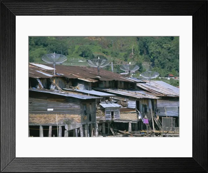 Framed Print : Stilt houses with satellite dishes Framed Print : Stilt houses with satellite dishes