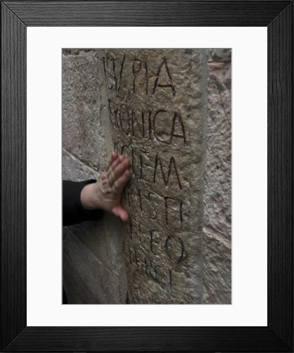 Framed Print : Pilgrims hand caressing the stone at Station VI on Framed Print : Pilgrims hand caressing the stone at Station VI on