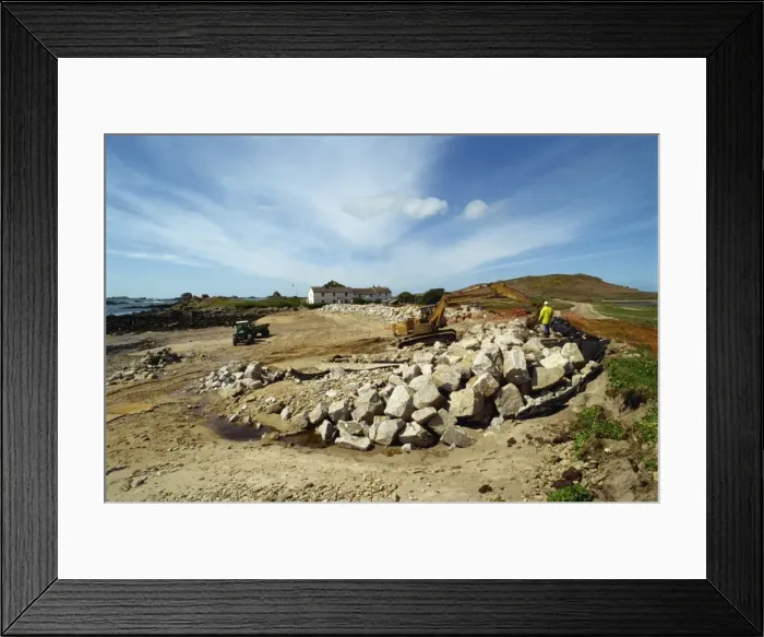 Framed Print : Building sea defences