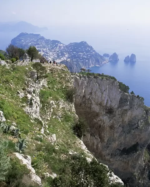 Distant Capri village and Faraglioni Rocks