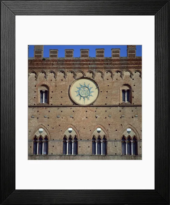 Framed Print : A bronze panel IHS (Jesus Mans Saviour), used as a badge by St Framed Print : A bronze panel IHS (Jesus Mans Saviour), used as a badge by St