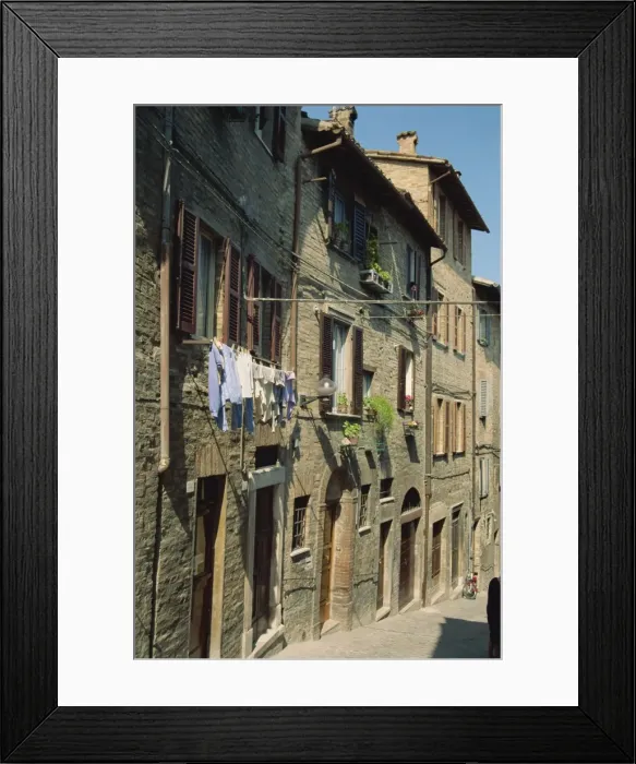 Framed Print : Houses on a narrow street in the town of Urbino Framed Print : Houses on a narrow street in the town of Urbino