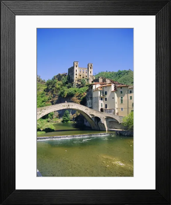Framed Print : Dorias Castle and medieval bridge across River Nervia Framed Print : Dorias Castle and medieval bridge across River Nervia
