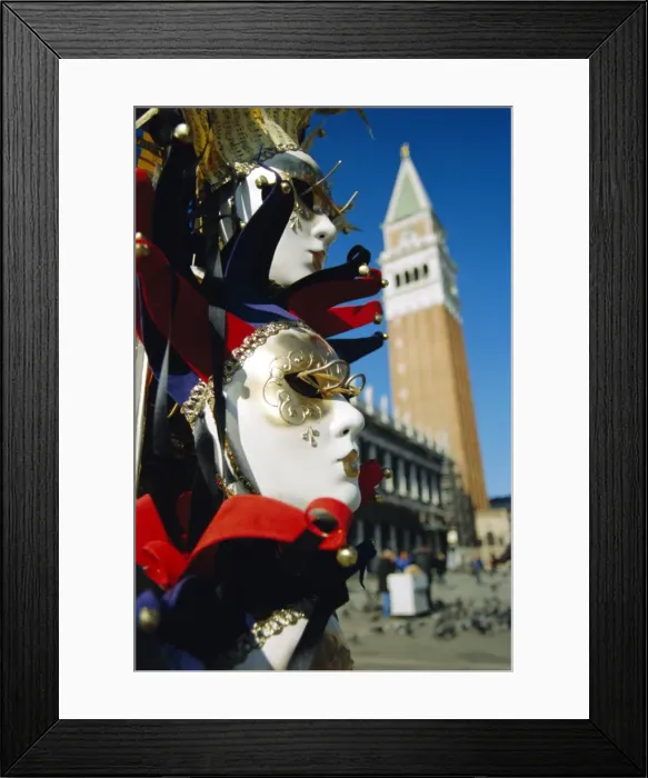 Framed Print : Carnival masks on souvenir stand and Campanile Framed Print : Carnival masks on souvenir stand and Campanile