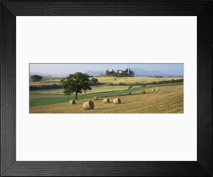 Framed Print : Hay rolls in fields below Belvedere Framed Print : Hay rolls in fields below Belvedere