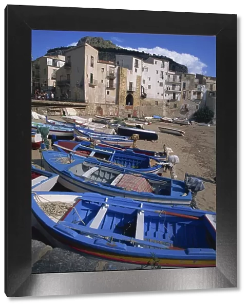 Small boats in the fishing harbour of Cefalu