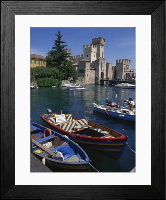 Framed Print : Moored boats in the harbour at Sirmione on Lake Garda Framed Print : Moored boats in the harbour at Sirmione on Lake Garda