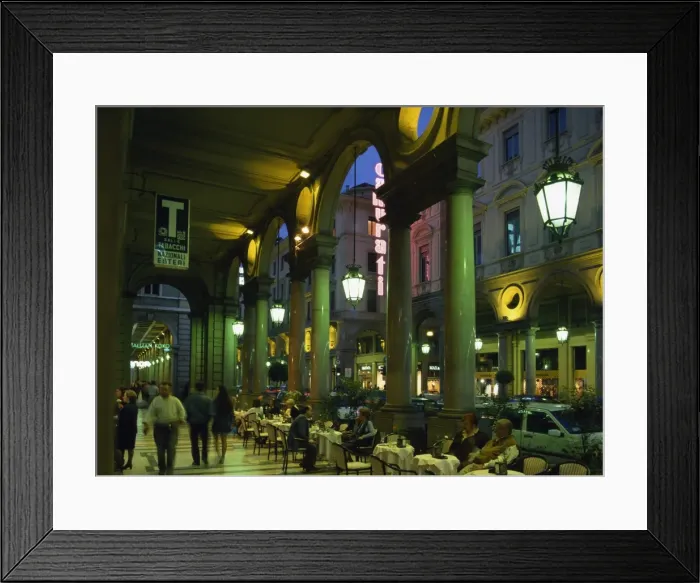 Framed Print : Cafes in the arcade on the Via Roma at night Framed Print : Cafes in the arcade on the Via Roma at night