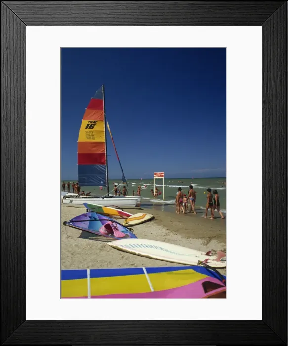 Framed Print : Sailing boats and windsurfing boards on beach at Rimini Framed Print : Sailing boats and windsurfing boards on beach at Rimini