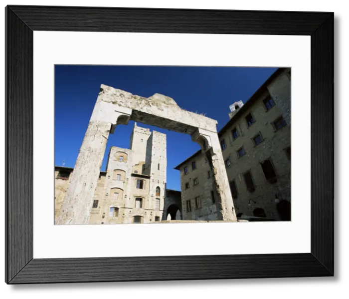 Framed Print : Towers lining the Piazza della Cisterna