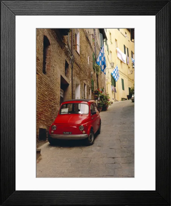 Framed Print : Red car parked in narrow street