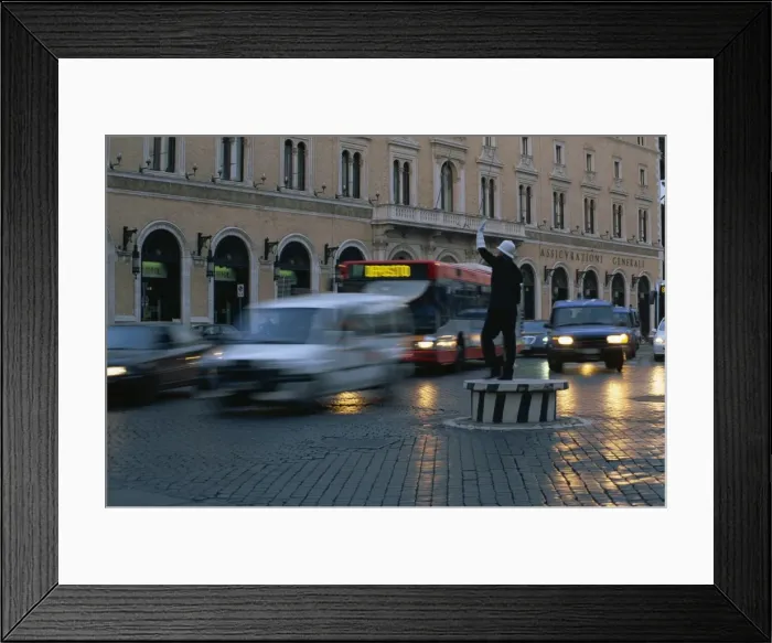Framed Print : Policeman in traffic duty in rush hour Framed Print : Policeman in traffic duty in rush hour