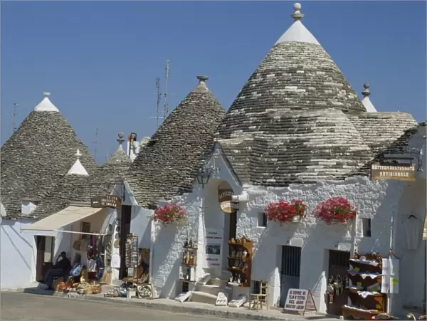 Conical roofs and whitewashed walls of Trullis in Alberobello