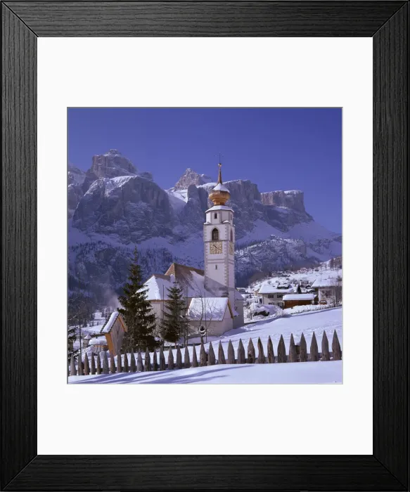 Framed Print : The church and village of Colfosco in Badia and Sella Framed Print : The church and village of Colfosco in Badia and Sella