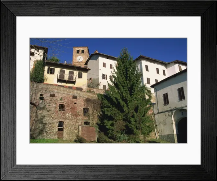 Framed Print : Houses and clocktower in the medieval quarter of Framed Print : Houses and clocktower in the medieval quarter of