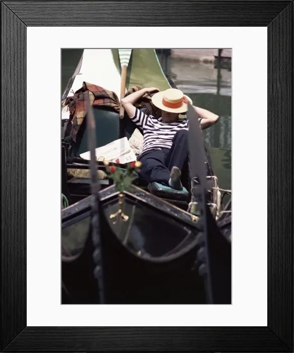 Framed Print : Gondolier relaxing in gondola Framed Print : Gondolier relaxing in gondola