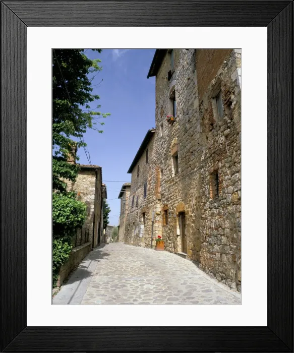Framed Print : View along Via Matteotti with the oldest building in Framed Print : View along Via Matteotti with the oldest building in