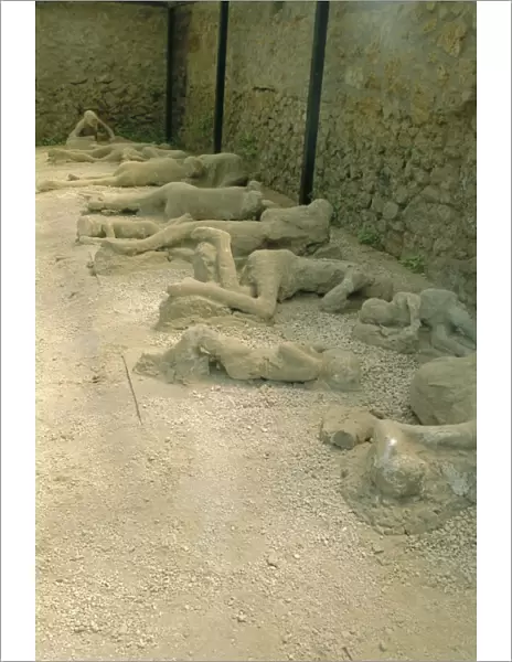 Casts of people buried in the destruction